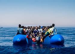 Image result for Migrant Boat Libya
