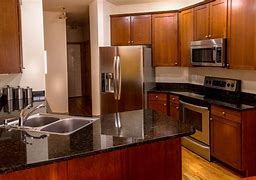 Image result for Black Stainless Steel Appliances with Dark Cabinets