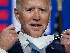 Image result for Joe Biden with Clock in the Background