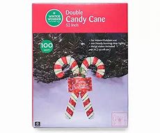 Image result for Winter Wonder Lane 8' Inflatable LED Santa & Candy Cane - Big Lots