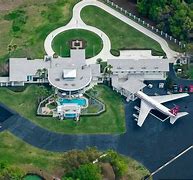 Image result for John Travolta House with Plane