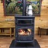 Image result for cast iron wood burning stove