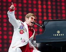 Image result for Elton John On Piano
