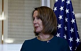 Image result for Nancy Pelosi Holding Small Flag