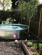 Image result for Stock Tank Swimming Pool Ideas