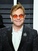 Image result for Elton John Flame Glasses