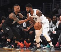 Image result for Damian Lillard Shoots Over Paul George