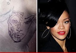 Image result for Chris Brown and Rihanna Wing Tattoos