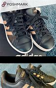 Image result for Black Adidas Shoes with Gold Stripes