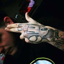 Image result for Gun Tattoos for Men