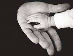 Image result for Public Domain Picture of Father Holding Child