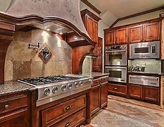 Image result for Black Stainless Steel Appliances with Off White Kitchen Cabinets