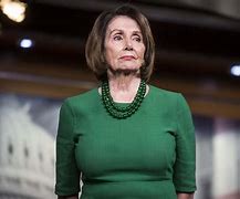 Image result for Nancy Pelosi in Black Dress with Prower Brooch