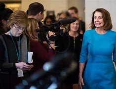 Image result for Nancy Pelosi in Yellow Dress