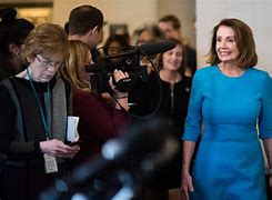 Image result for nancy pelosi red blouse