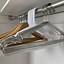 Image result for Space-Saving Hangers Wood