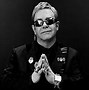 Image result for Elton John with Dollar Sign Glasses