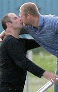 Image result for Travolta Kissing Man On Plane