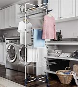 Image result for clothing hanger racks for laundry rooms