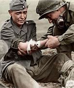 Image result for Helping Wounded Soldiers