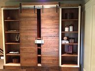 Image result for Built in Bookshelves with Doors