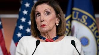 Image result for Nancy Pelosi Pink Dress with Mask