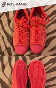 Image result for Red and Black Shell Toe Adidas