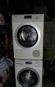 Image result for Bosch Stainless Steel Stackable Washer and Dryer