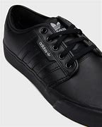 Image result for black adidas sneakers