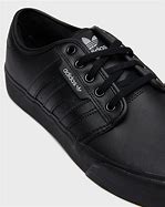 Image result for Adidas Black Coaching Shoe