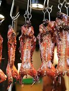 Image result for People Hanging From Meat Hooks