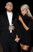Image result for Ariana Grande and Chris Evans