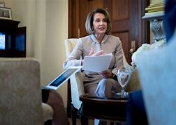 Image result for Nancy Pelosi with Toilet Paper Earrings On