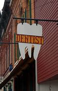 Image result for Dented Cans Signage