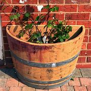 Image result for Wooden Pot for Plants Barrel Shape