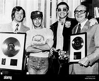 Image result for Elton John 70s Smiling