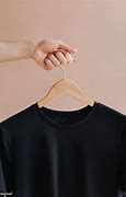 Image result for Black T-Shirt On Hanger