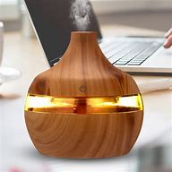 Image result for Ultimate Aromatherapy Diffuser & Essential Oil Set - Ultrasonic Diffuser & Top 10 Essential Oils - 400Ml Diffuser With 4 Timer & 7 Ambient Light