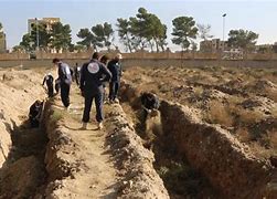 Image result for Bodies in Mass Grave