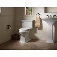 Image result for Kohler K-3933 Memoirs Stately 1.28 GPF Two-Piece Round Comfort Height Toilet With Aquapiston Technology - Seat Not Included White Fixture Toilet
