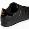Image result for Adidas Black Gold Sneakers