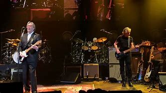 Image result for Eric Clapton and Roger Waters Shooting