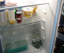Image result for Black Frigidaire Refrigerator Moving Freezer Shelve