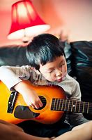 Image result for Asian Kid Playing Guitar