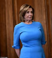 Image result for Pelosi Looking at Papers