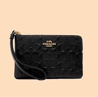 Image result for coach women's corner zip wristlet in signature canvas with ornament print - gold/brown black multi