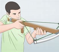 Image result for Person Holding Crossbow