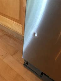 Image result for Refrigerator Dented Hardwood Floor