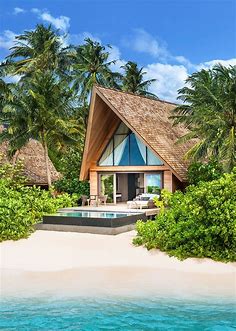 The St. Regis Maldives Vommuli Resort, Maldives. Luxury Hotel Review by TravelPlusStyle in 2022 | Luxury beach house, Beach house design, Resort architecture