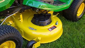Image result for Push Riding Mower